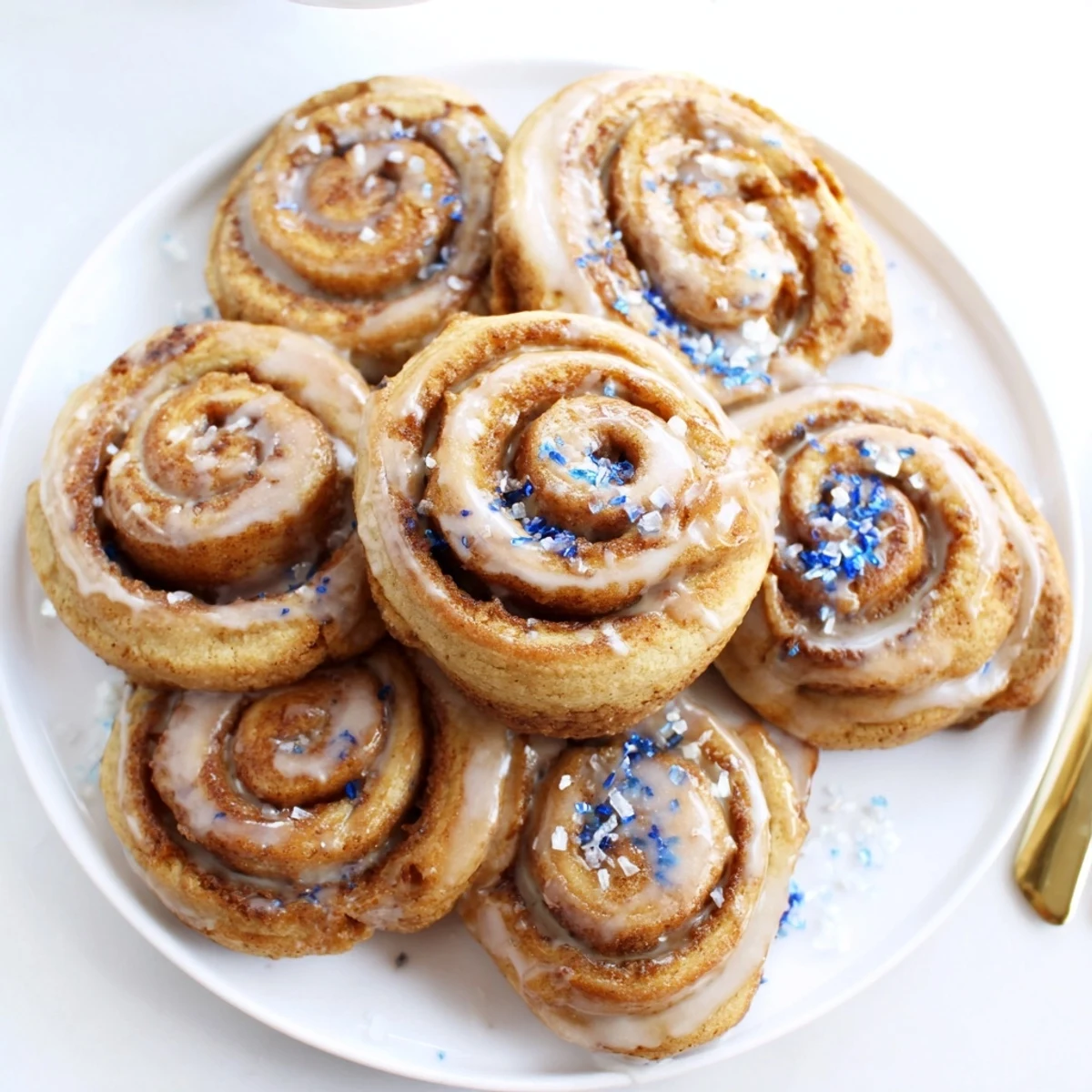 Soft Gingerbread Hanukkah Cinnamon Roll Cookies with a warm cinnamon-sugar swirl appeal.  