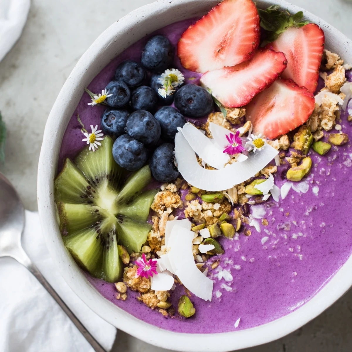 Colorful Vibrant Smoothie Bowls showcasing pistachio and purple yam for breakfast bliss.  