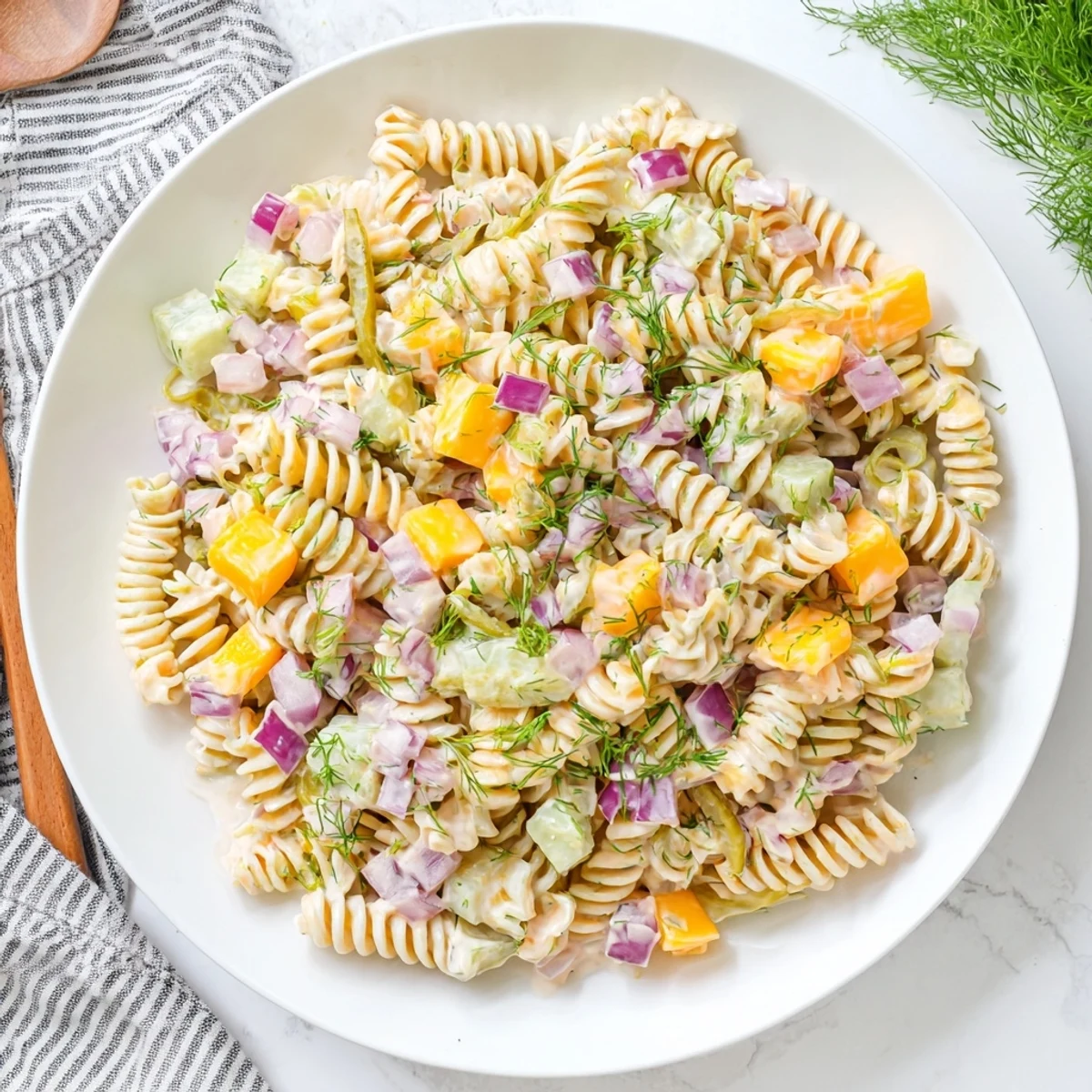Close-up of a refreshing Dill Pickle Pasta Salad, perfect for a summer gathering or picnic.