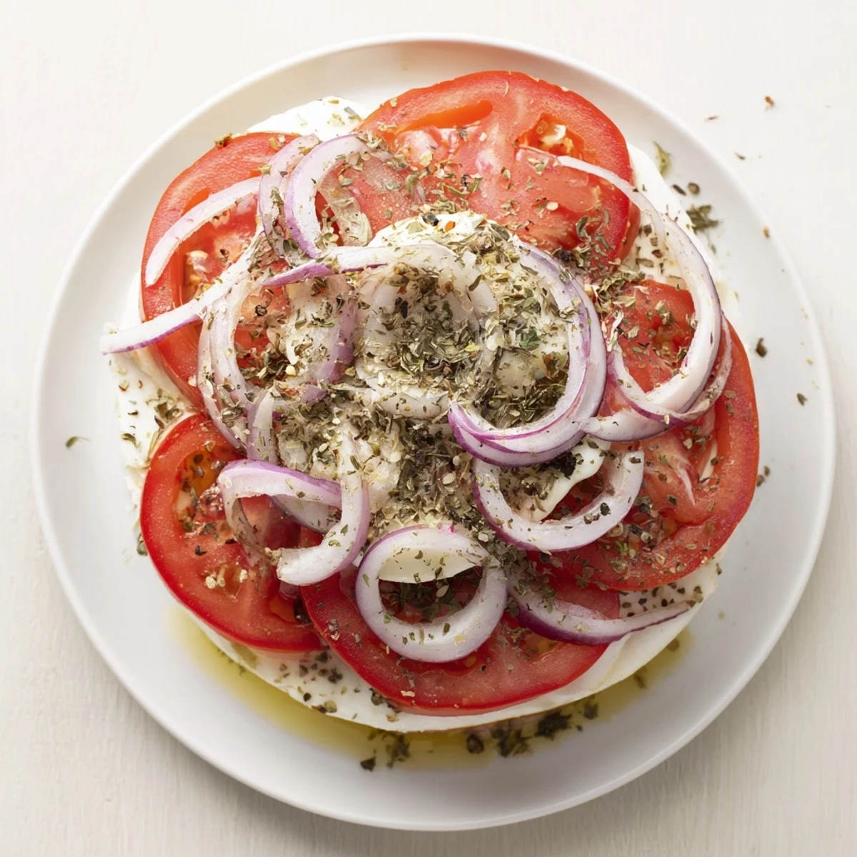 Oven-baked Speedy Feta-Free Tomato Bake showcasing melted mozzarella with tender, roasted tomatoes and herbs.