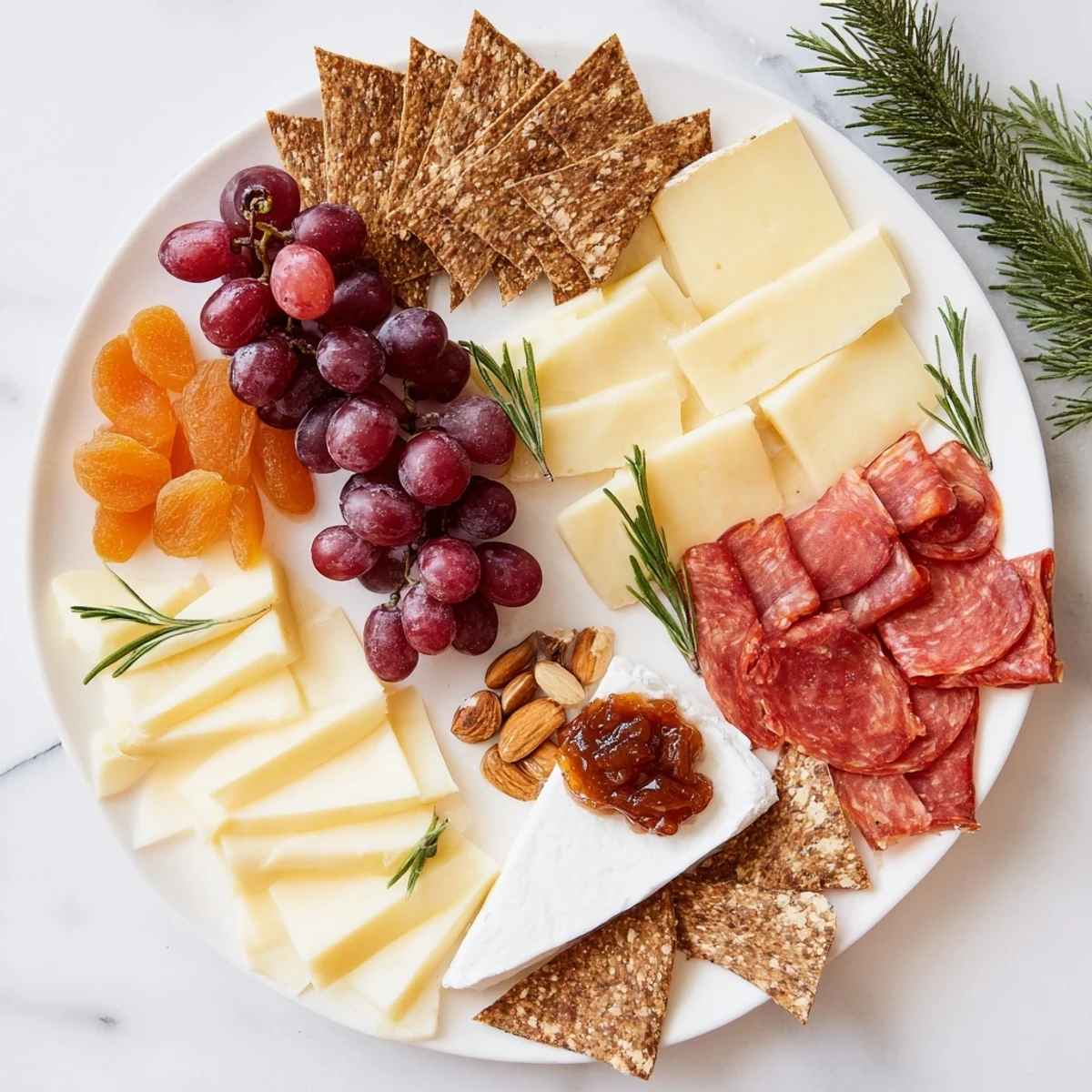Vibrant Geometric Gala appetizer features meticulously cut triangles and rhombuses of cheeses and meats.