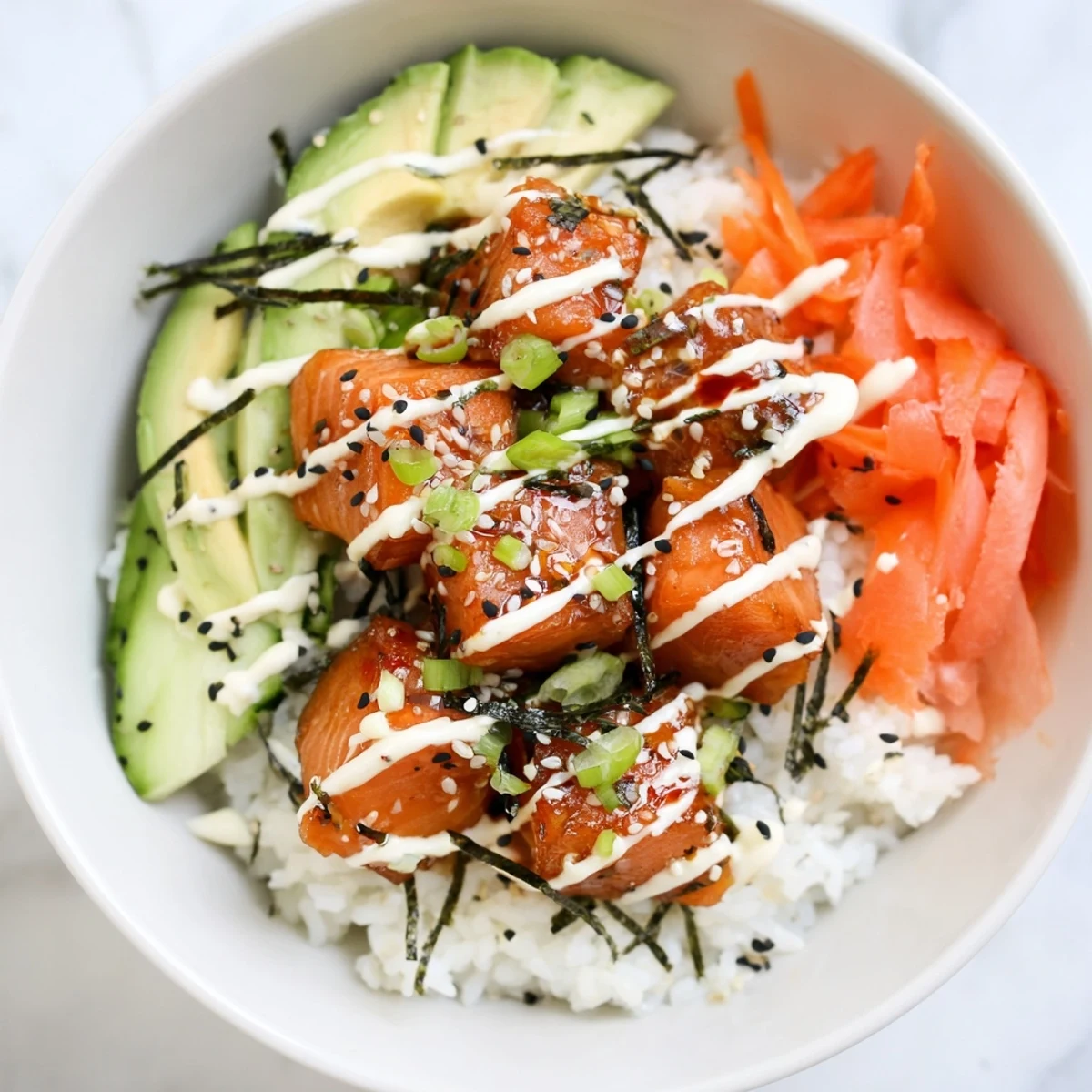 This Salmon Bites Bowl features perfectly cooked salmon, colorful veggies, and creamy sauce, a must-try dish!