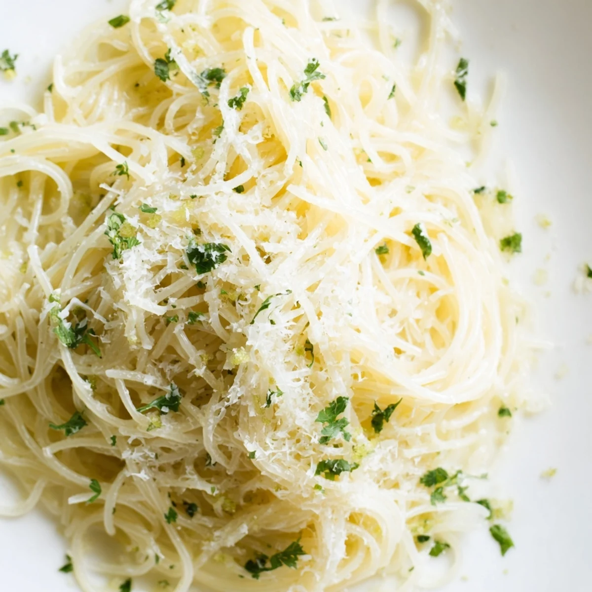 Quick 20-minute Lemon Butter Pasta Light recipe plated with a sprinkle of black pepper, ready for a light vegetarian dinner.