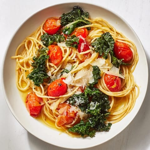 A close-up of the delicious one-pot spaghetti, showing tender kale nestled amongst the spaghetti and rich sauce.
