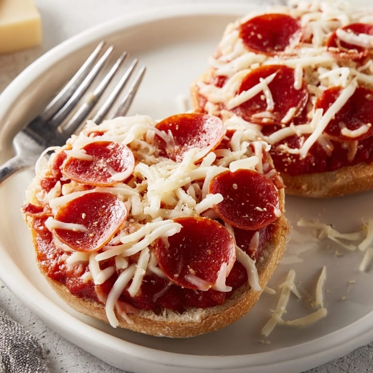 Homemade Pizza Bagel Bites: warm, cheesy comfort food, ready in minutes, great for parties.