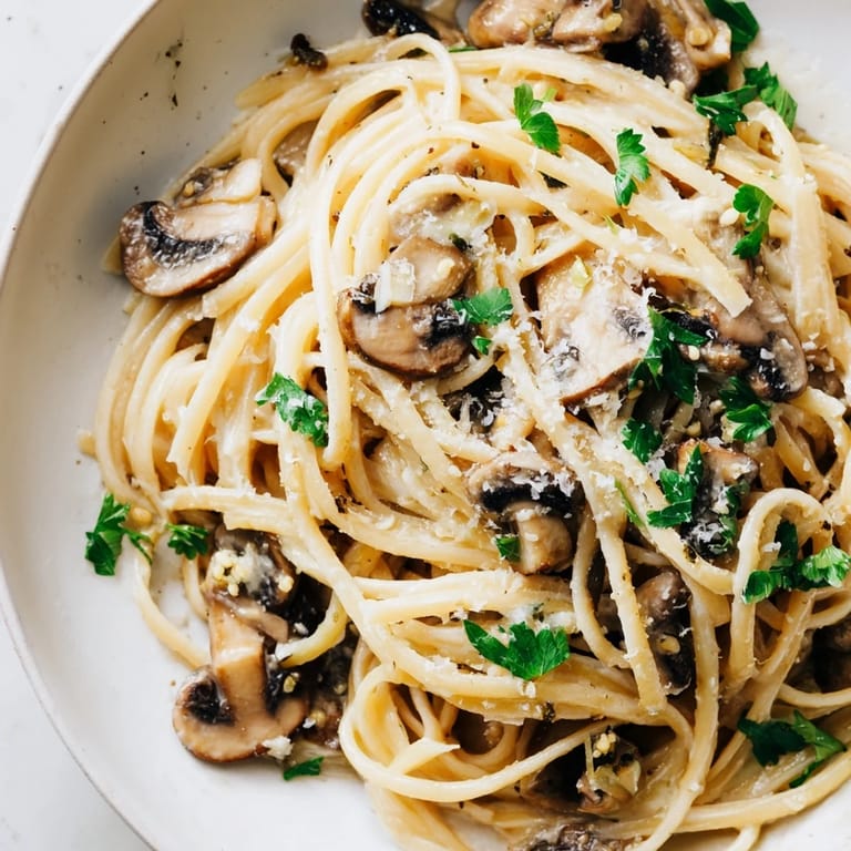Creamy Mushroom Linguine features tender cremini and shiitake mushrooms in a light, savory sauce.  